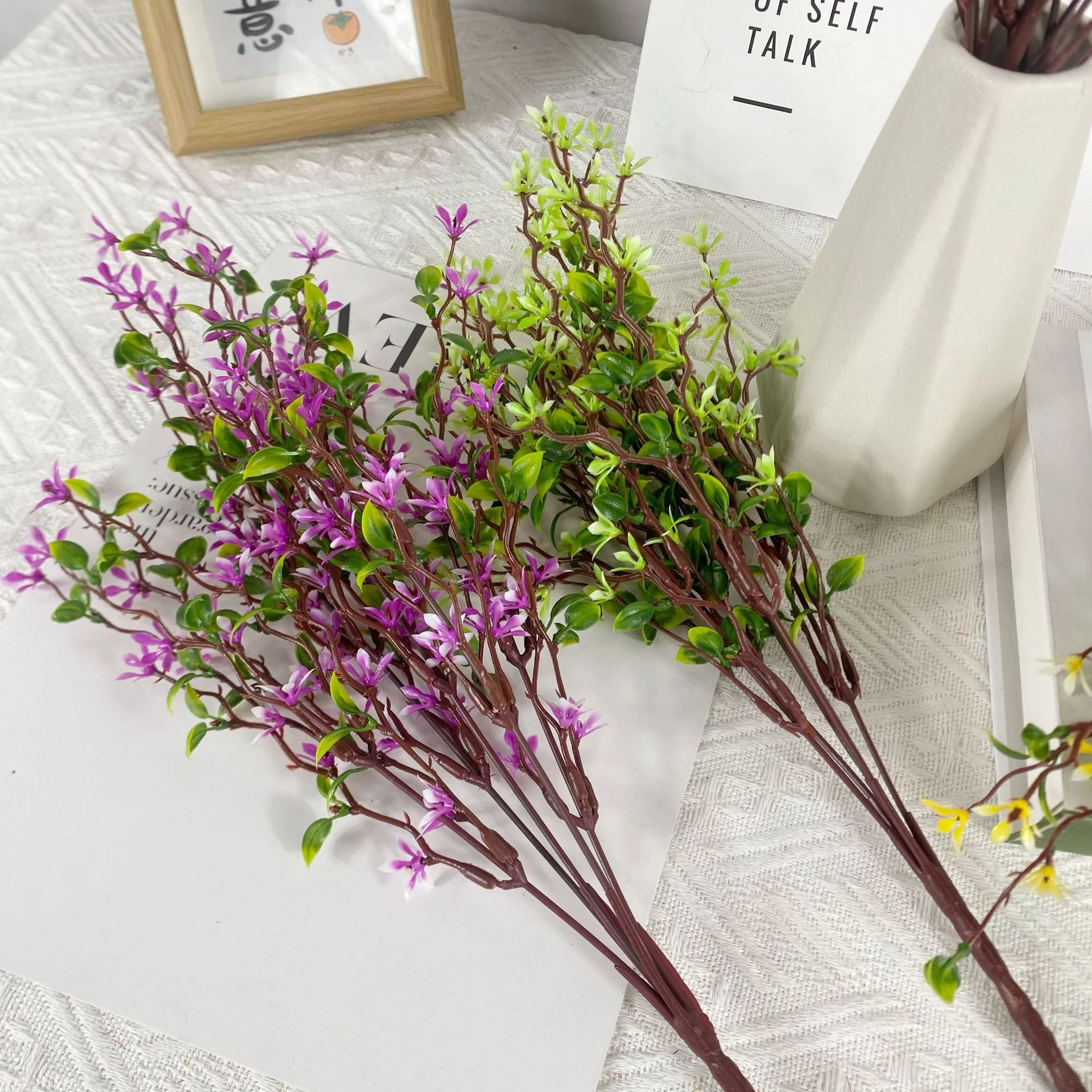 Artificial Jasmine Flower Bush arranged for decorative display