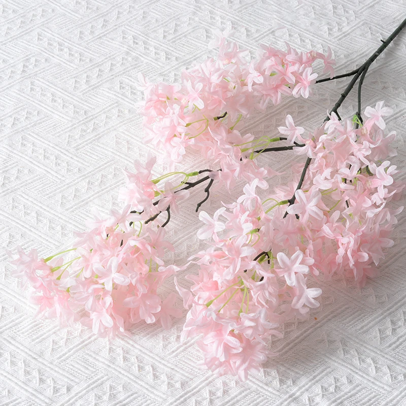 Pink artificial larkspur spray