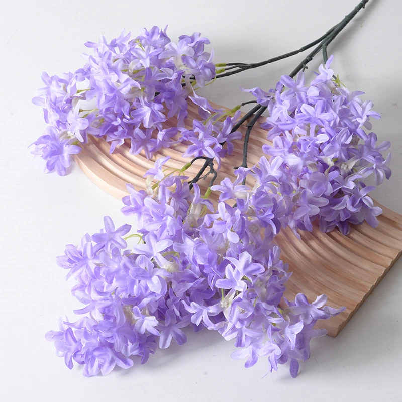 Close-up of purple artificial larkspur spray