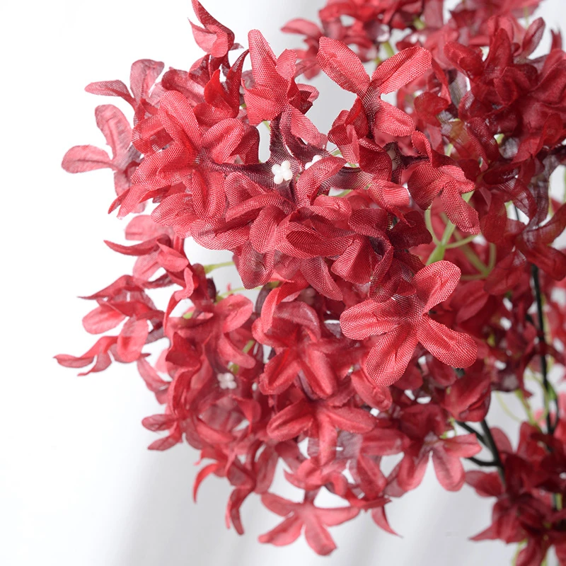 Close-up of red artificial larkspur spray