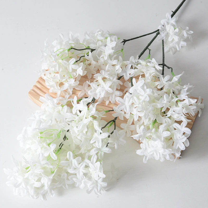 White artificial larkspur spray