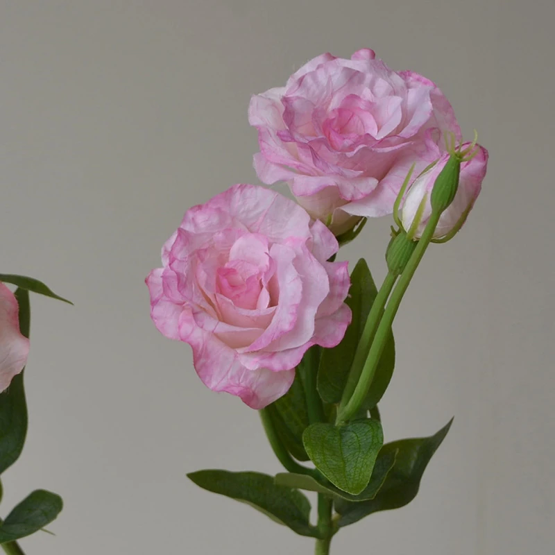 Close-up of pink artificial lisianthus stem
