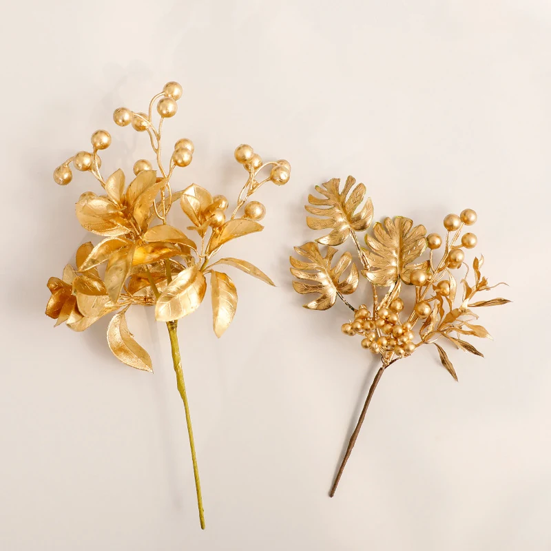 Gold metallic Christmas floral pick styles with berries and leaves