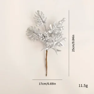 Silver metallic Christmas pick with monstera leaves and berries, 25 cm