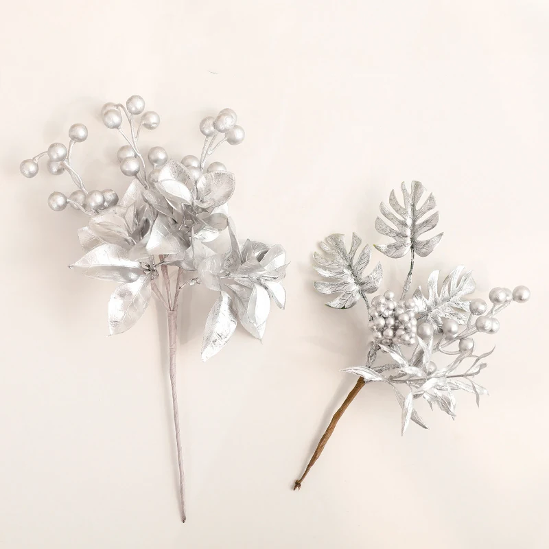 Silver metallic Christmas floral pick styles with berries and leaves