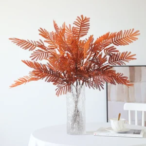 Artificial Mimosa Leaf Spray shown in a decorative display