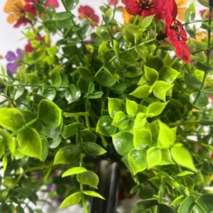 Close-up of flowers and foliage on artificial topiary ball