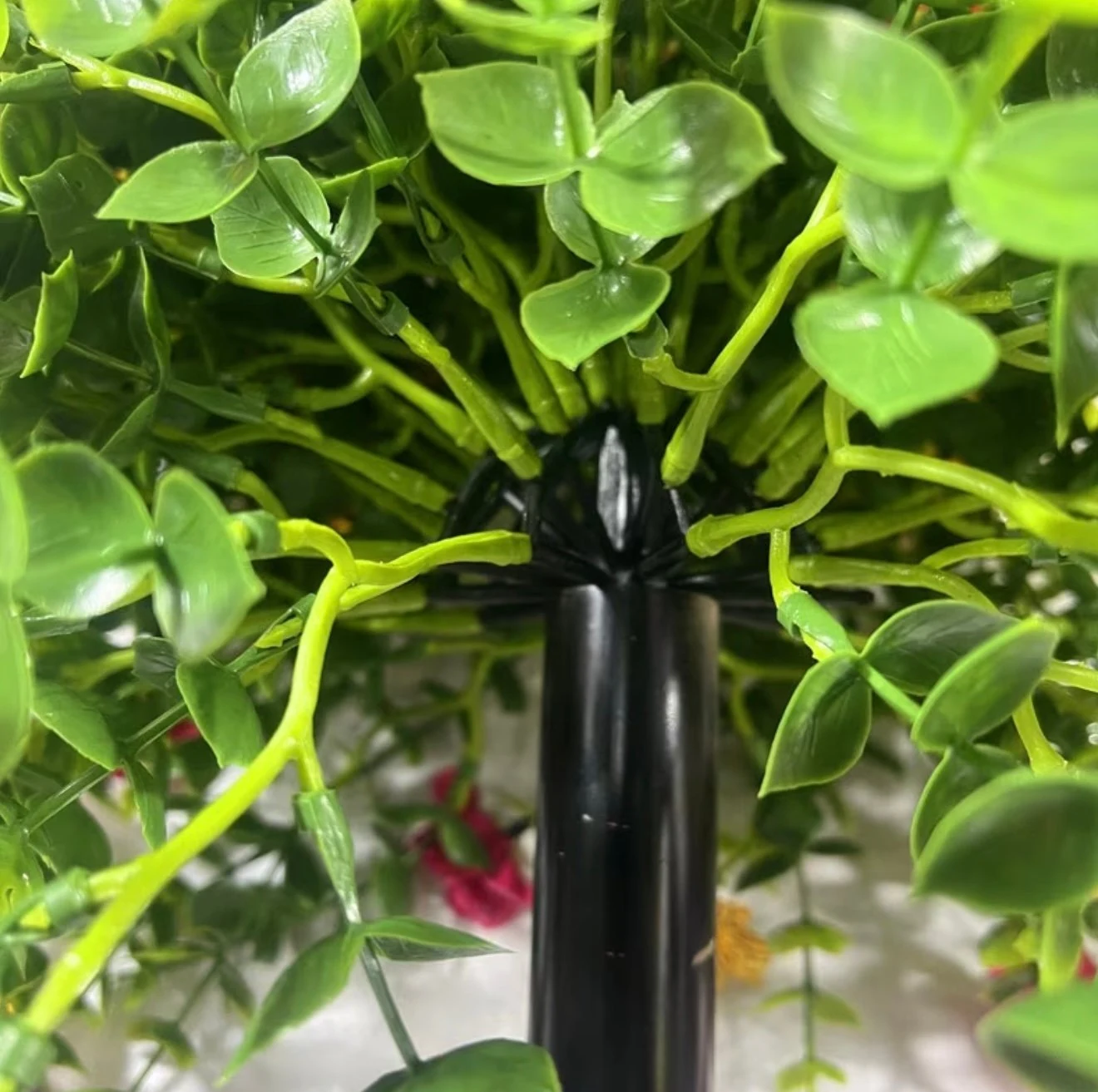 Internal support and detachable stake detail of artificial flower topiary