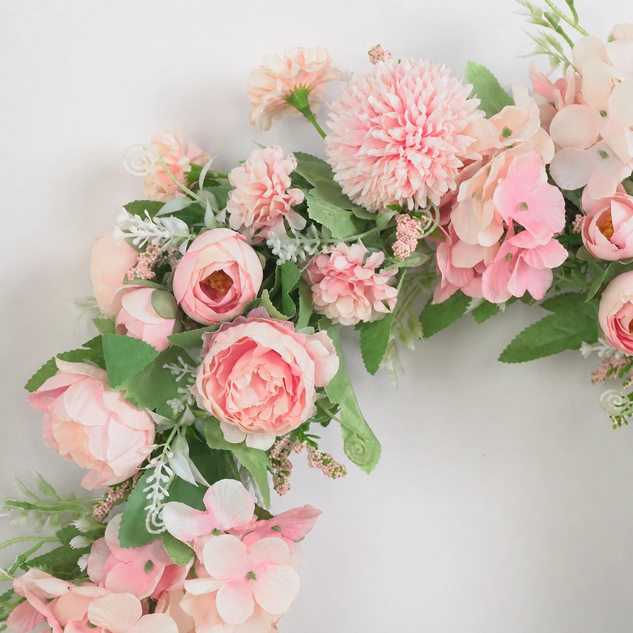 Close-up of artificial Mixed Flower Wreath pink