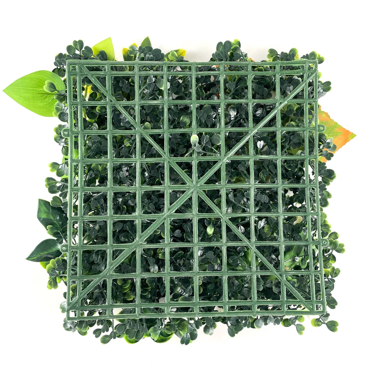 Close-up of grid backing for artificial mixed green wall panel