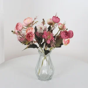 Application display of pink artificial mixed rose flower bouquet