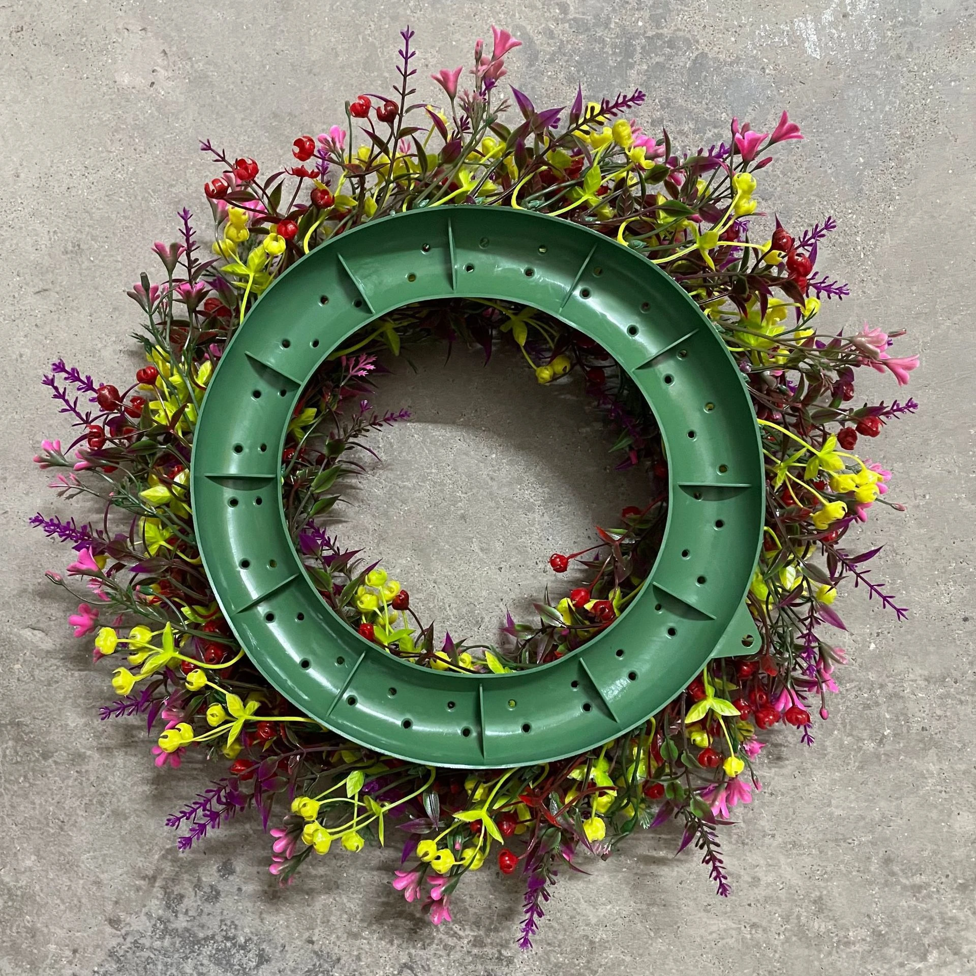Back view of artificial mixed wildflower wreath collection