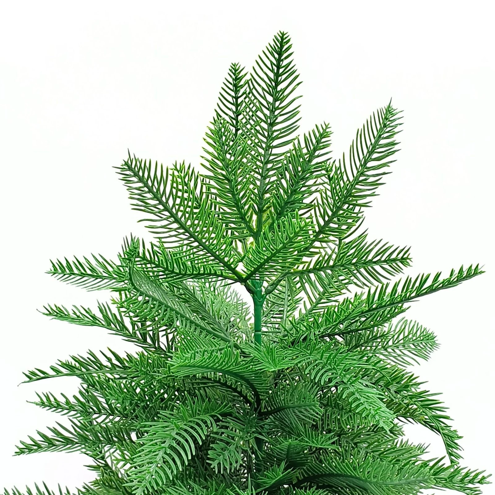 Close-up of layered artificial Norfolk pine foliage