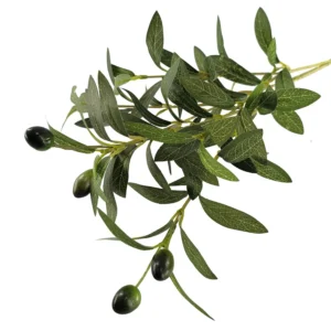 Close-up of artificial olive leaves and olive fruit