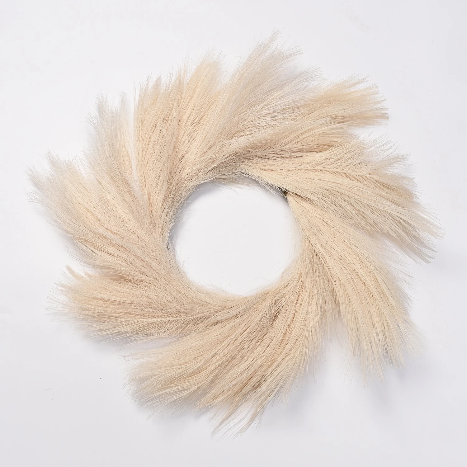 Cream artificial pampas grass wreath on a white background