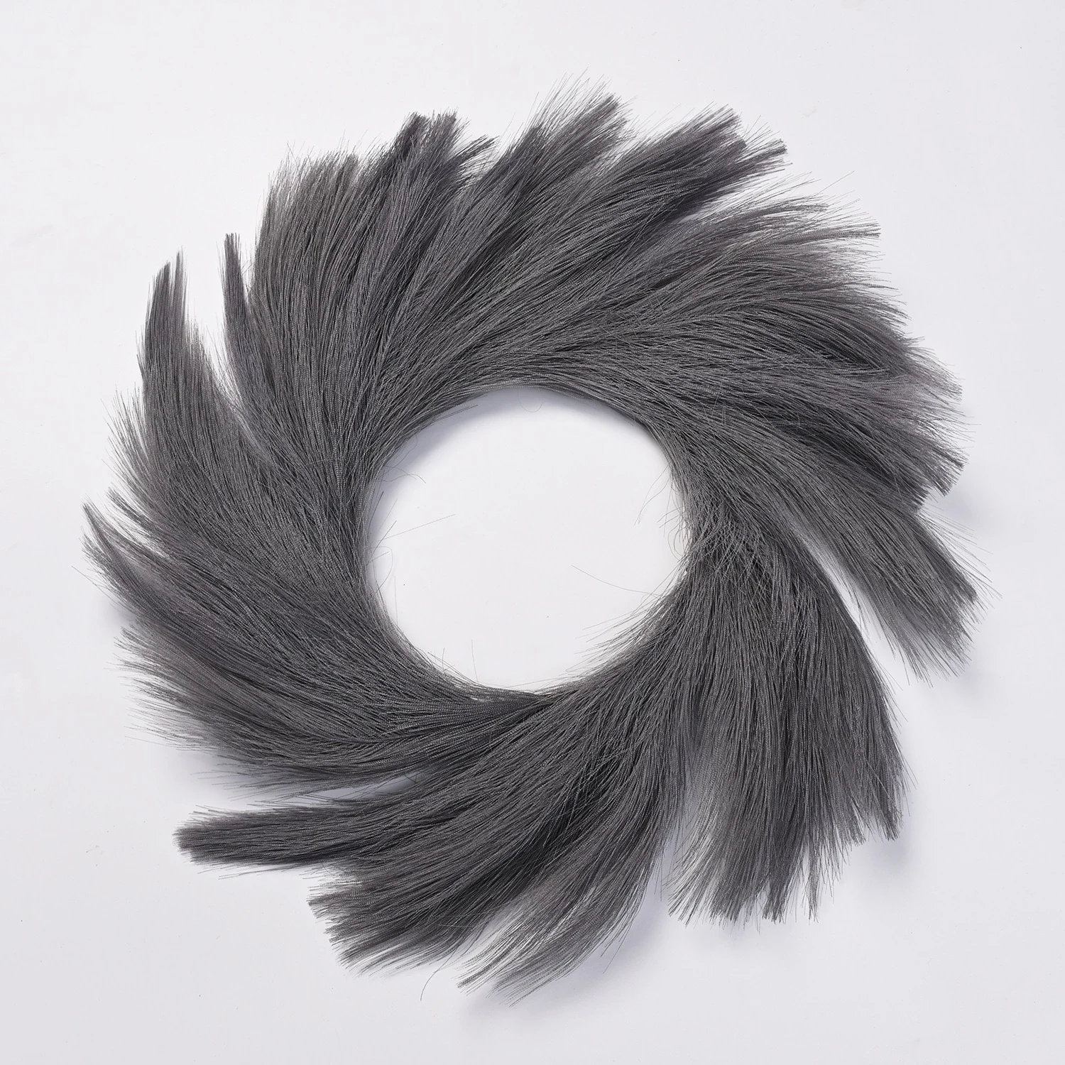 Gray artificial pampas grass wreath on a white background