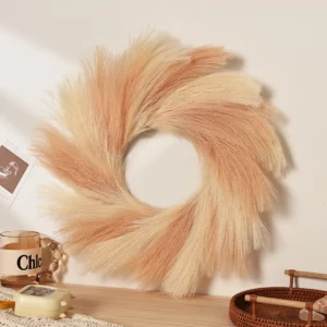 Peach artificial pampas grass wreath in a styled home display