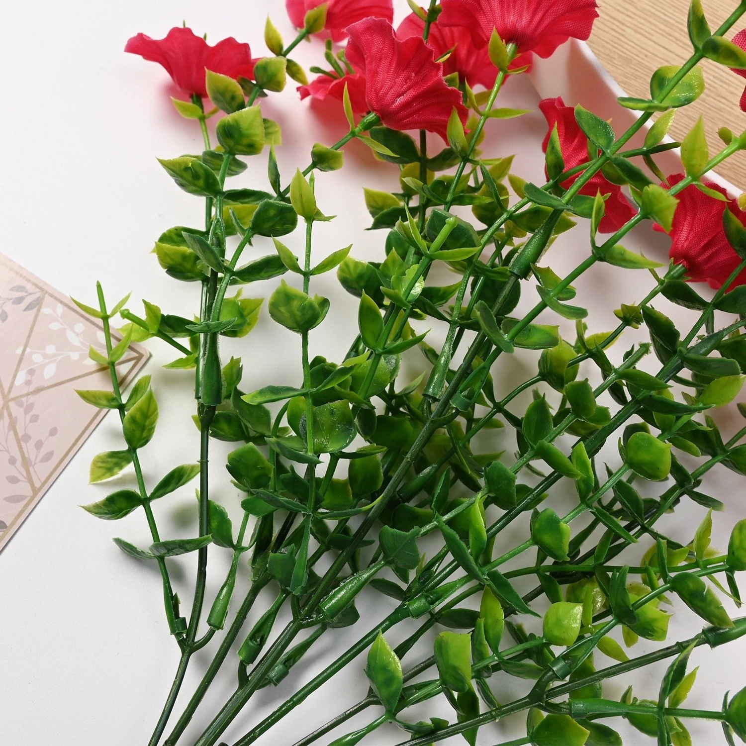 Close-up of artificial petunia branching stems and foliage