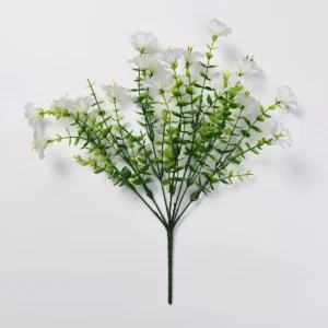 White artificial petunia flower bush on a white background