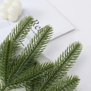 Close-up of artificial green pine needle foliage
