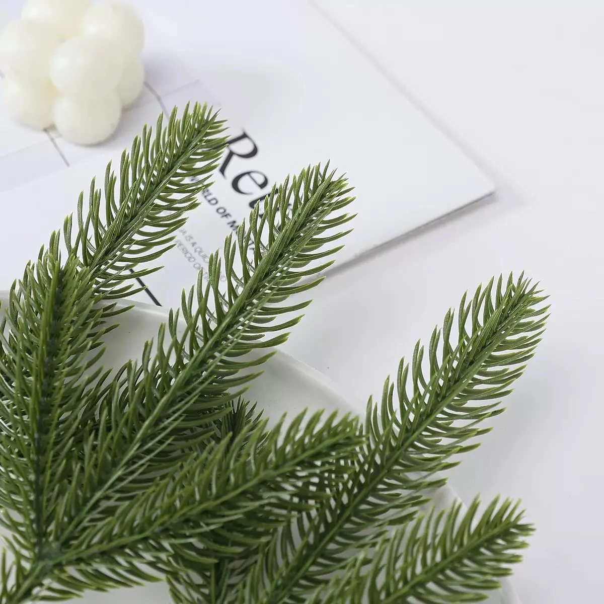 Close-up of artificial green pine needle foliage