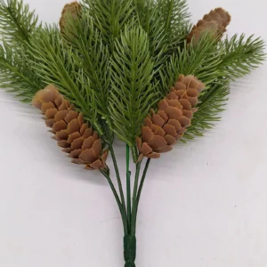 Close-up of pinecones and layered needles on artificial evergreen bush