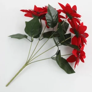Side view of red artificial poinsettia flower bush