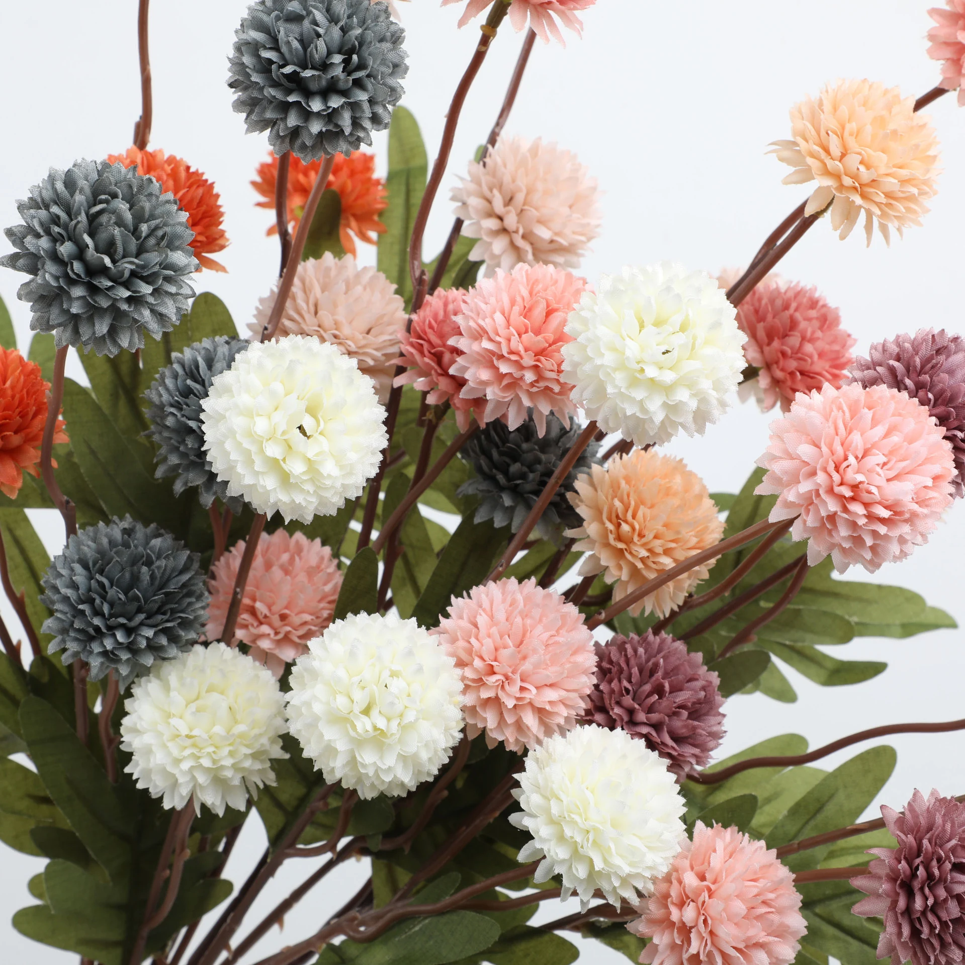 Close-up of flower head detail for artificial pom pom flower spray