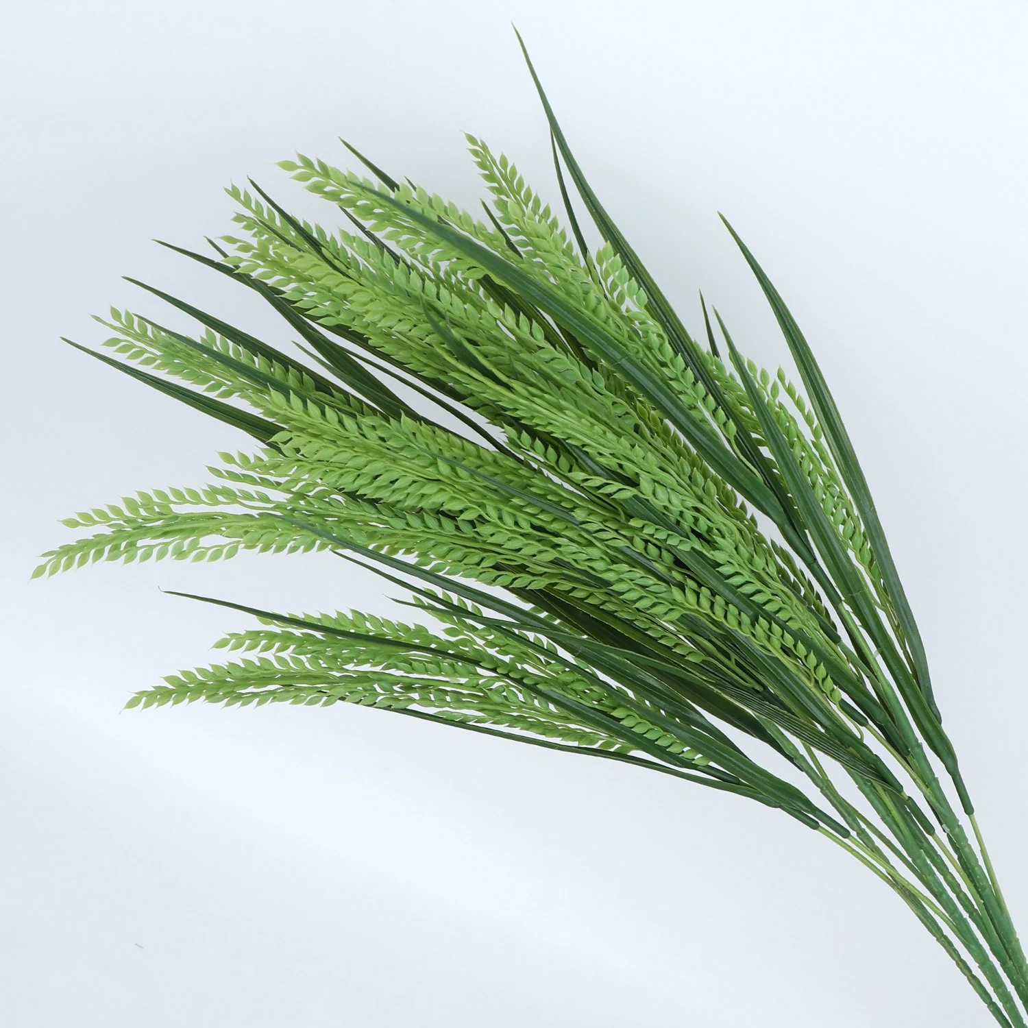 Green artificial rice stems with slender leaves