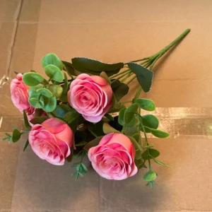 Real-photo view of pink artificial rose bouquet bush