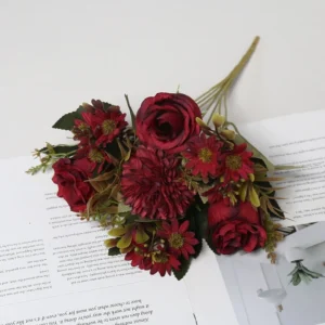 Burgundy artificial rose and daisy mixed flower bouquet