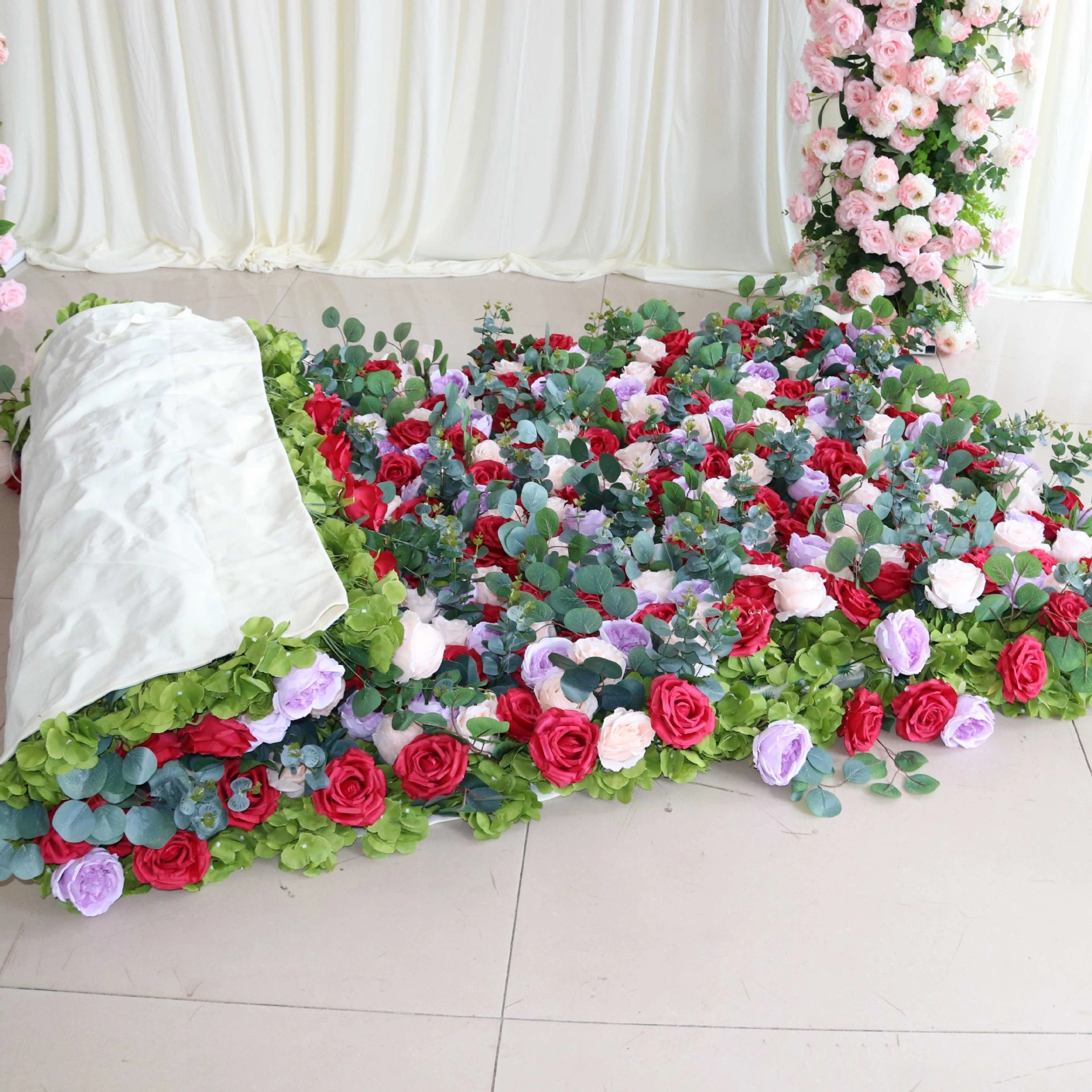 Artificial Rose Eucalyptus Flower Wall Backdrop displayed for floor display