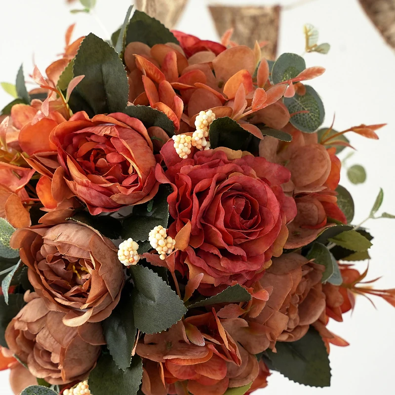 Close-up of autumn artificial rose hydrangea flower kissing ball