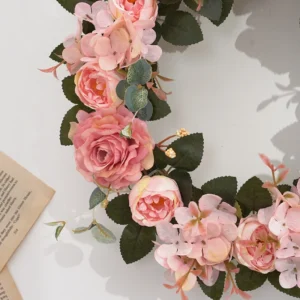 Close-up of light pink artificial roses and hydrangea flowers