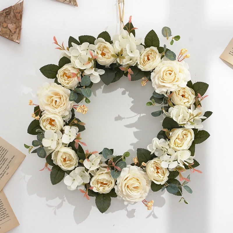 White artificial rose and hydrangea wreath