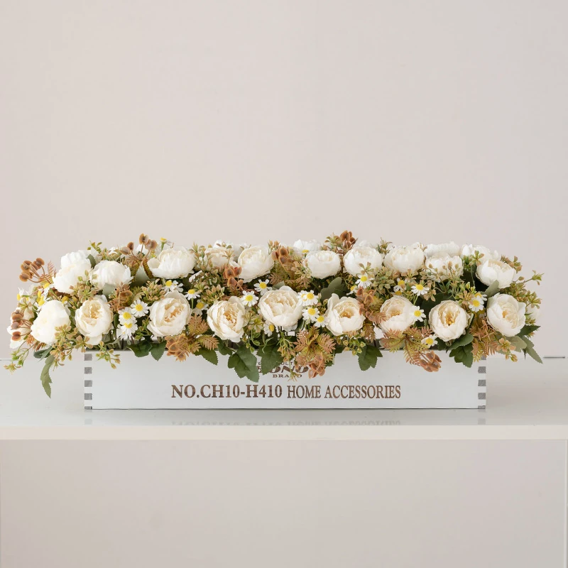 white artificial rose ranunculus flower box centerpiece