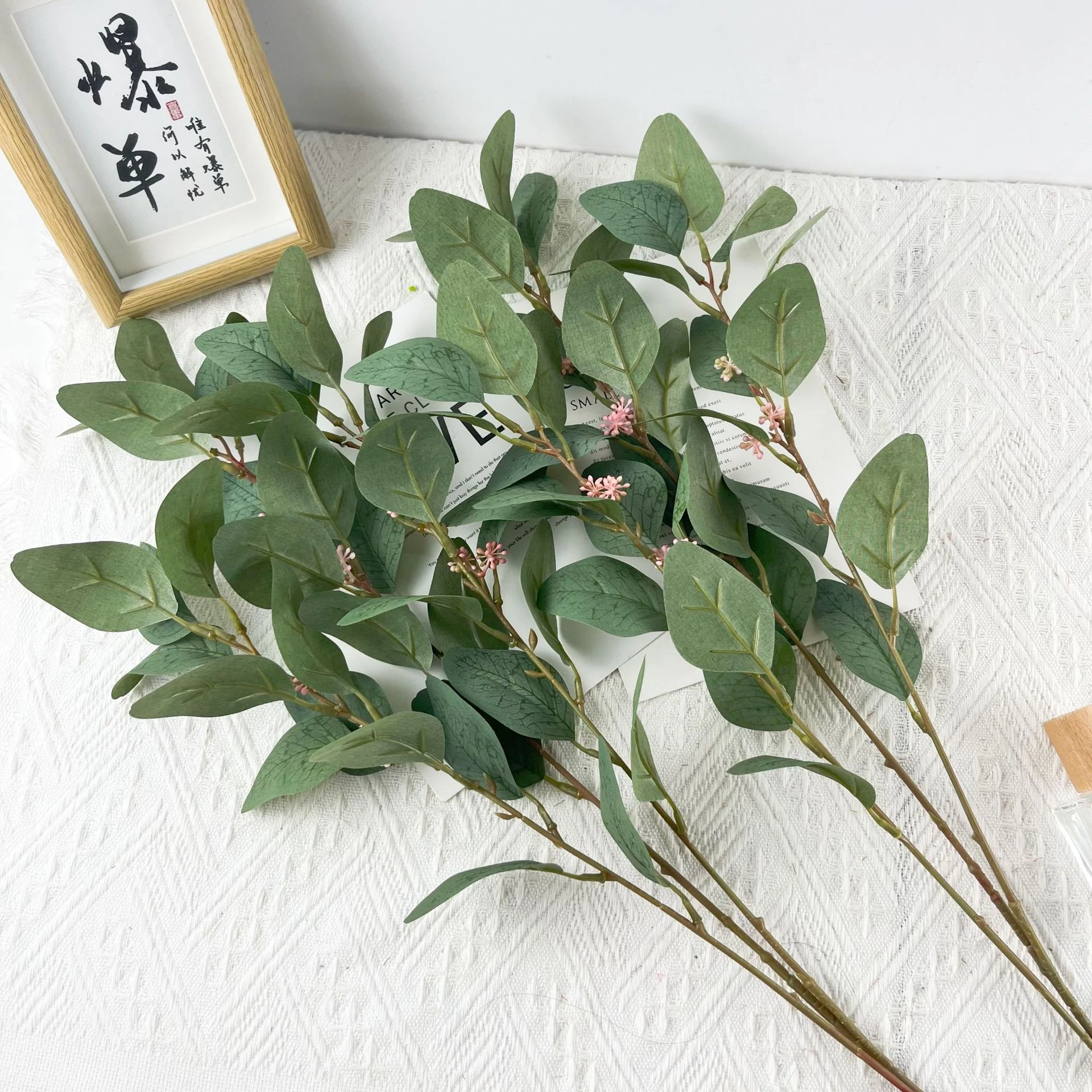 Artificial Seeded Eucalyptus Branch displayed for bouquet