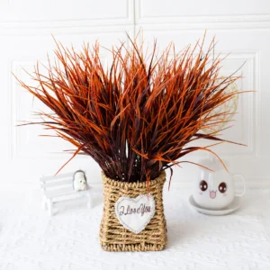 Autumn red artificial grass bushes arranged in a vase