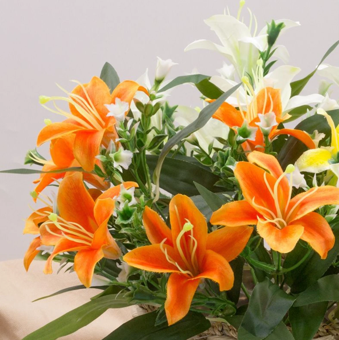 Orange artificial Seven-Head Lily Flower Bush arranged for decorative display