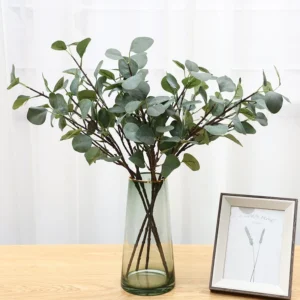 Artificial Silver Dollar Eucalyptus Branch displayed for vase