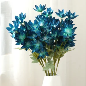 Artificial Six-Head Snow Lotus Flower Stem shown in blue vase application