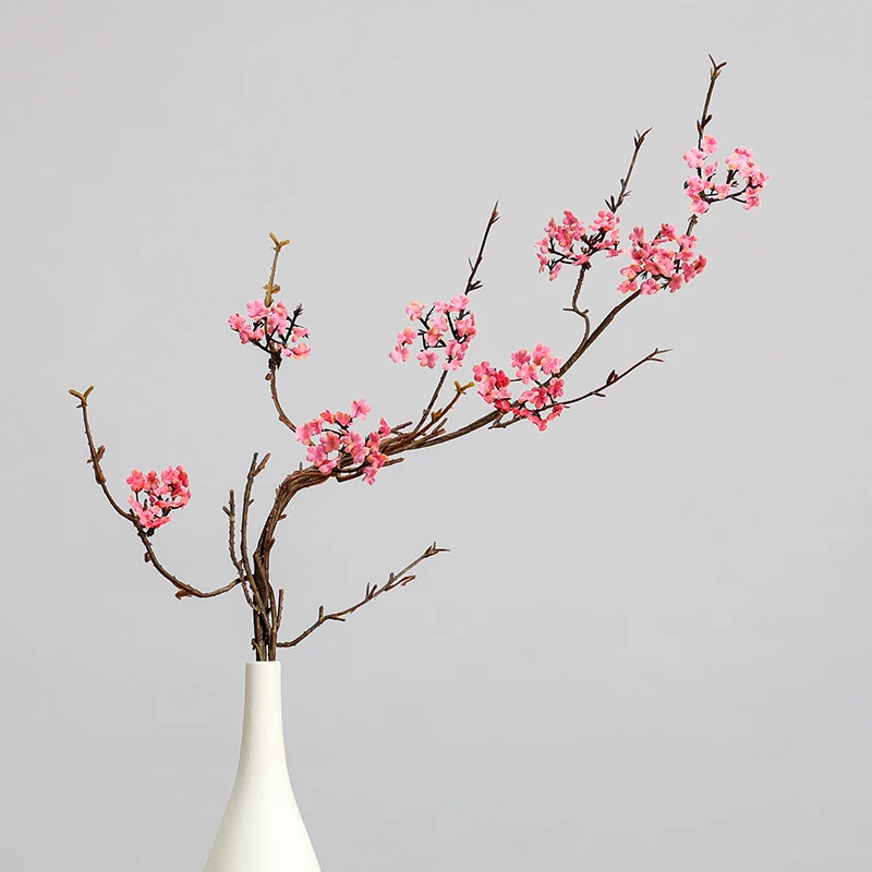 Pink artificial small blossom branch