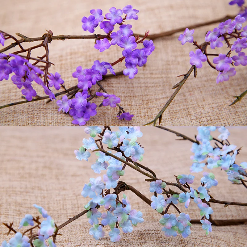 Close-up of purple blue detail for artificial small blossom branch