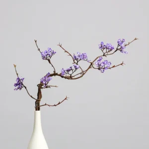 Purple artificial small blossom branch