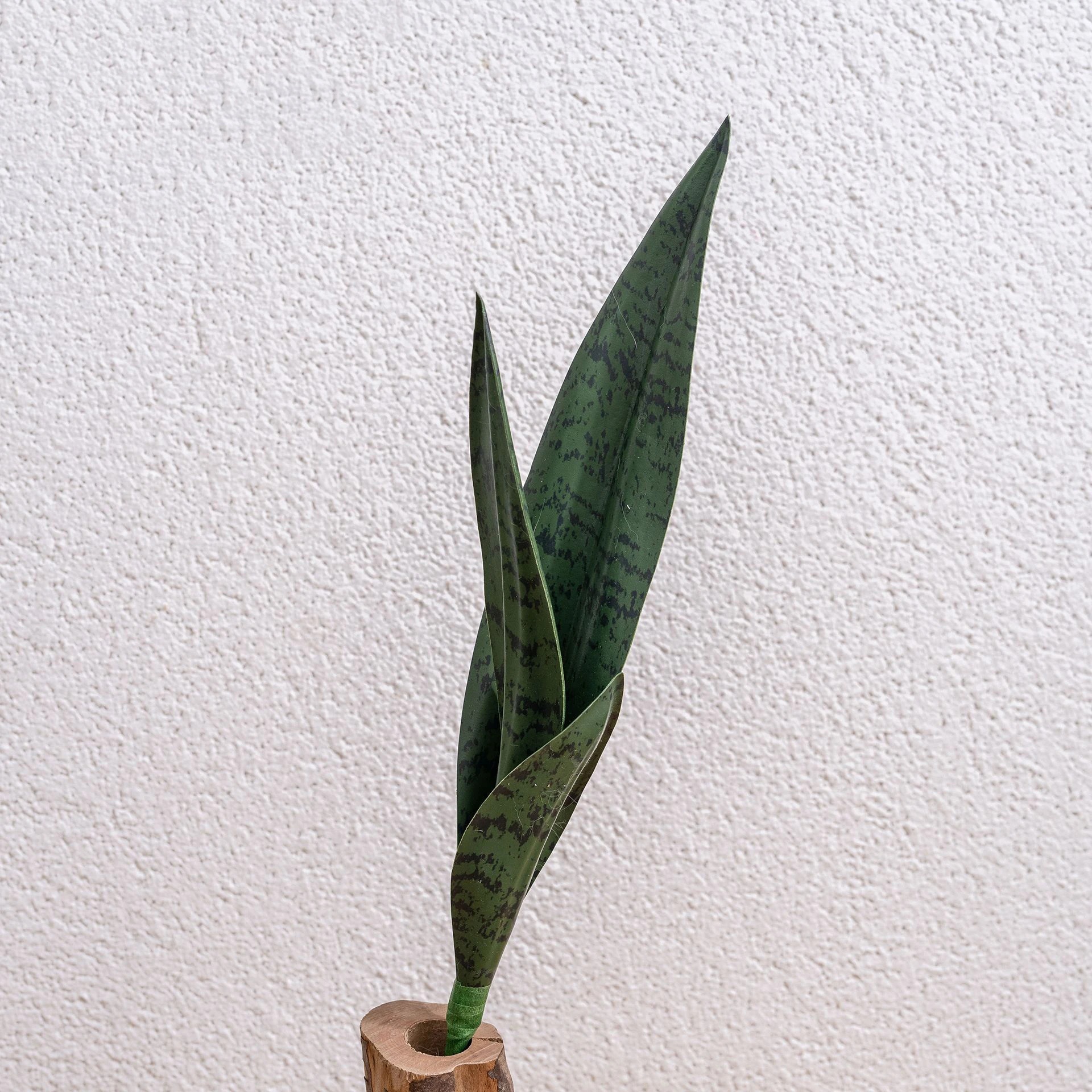 Alternate view of dark green artificial snake plant leaf insert