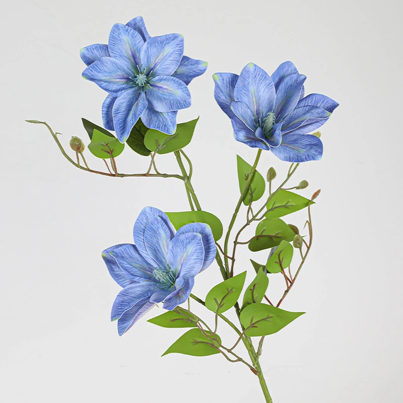 Close-up of blue artificial three-head clematis flower stem