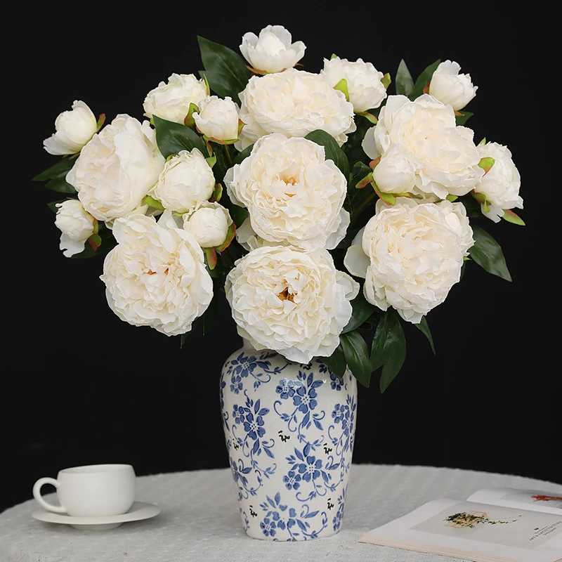 Application display of white artificial three-head peony spray