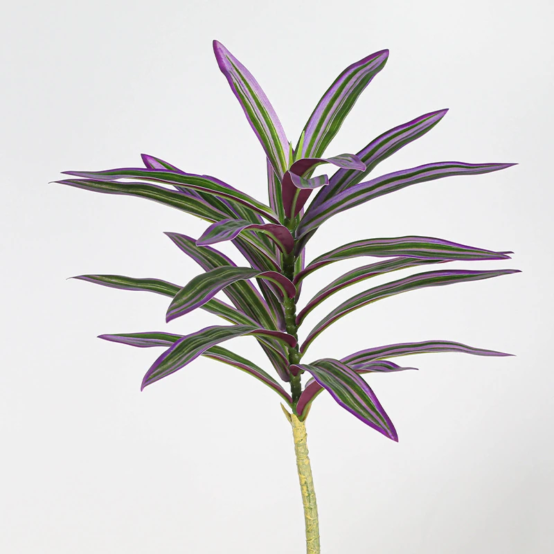 Close-up of purple edged artificial variegated dracaena leaf stem collection