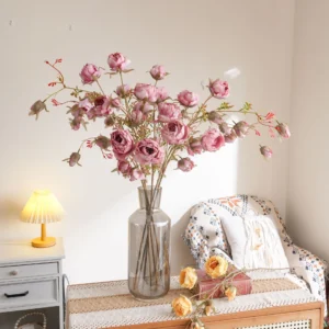 Application display of pink artificial wild rose spray