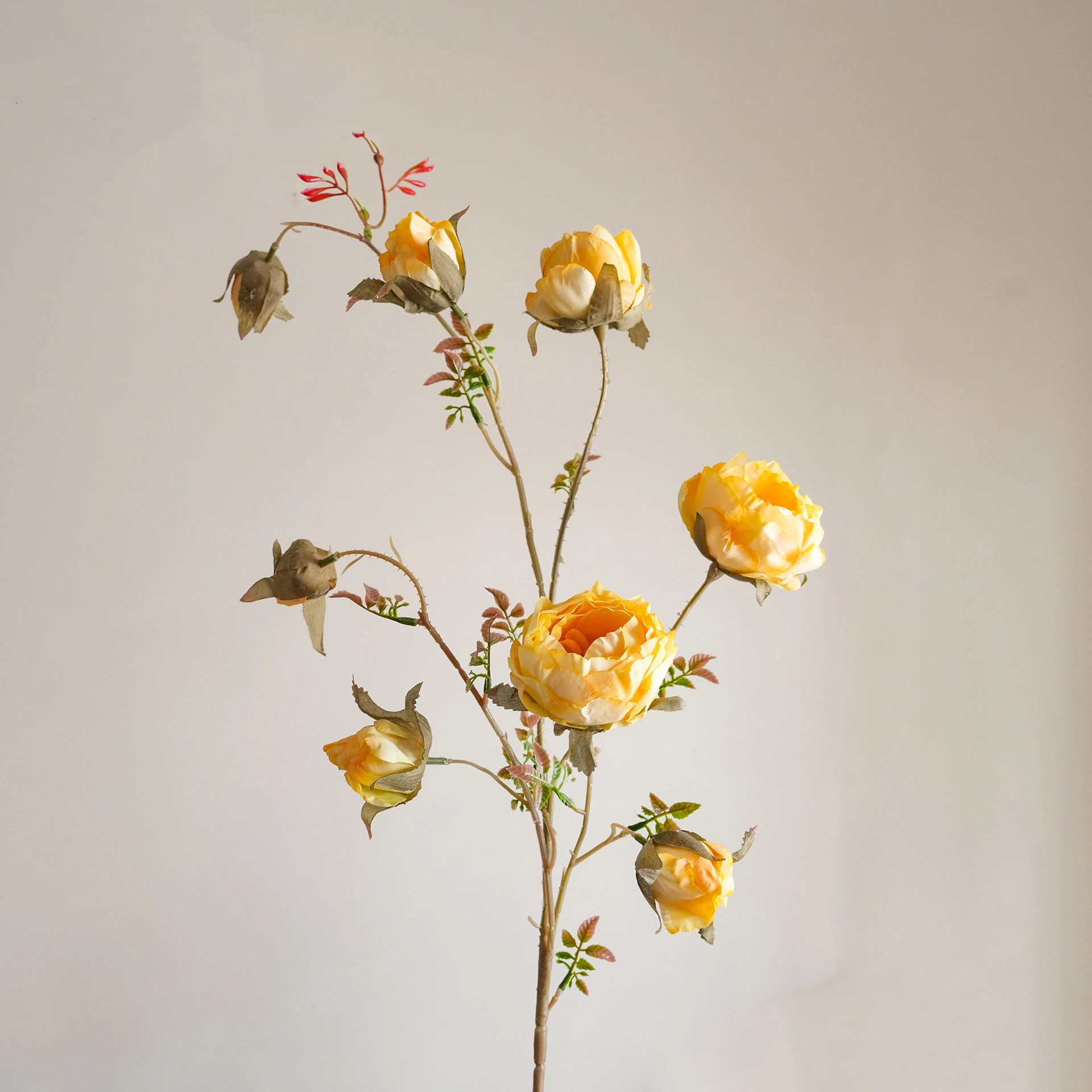 Yellow artificial wild rose spray